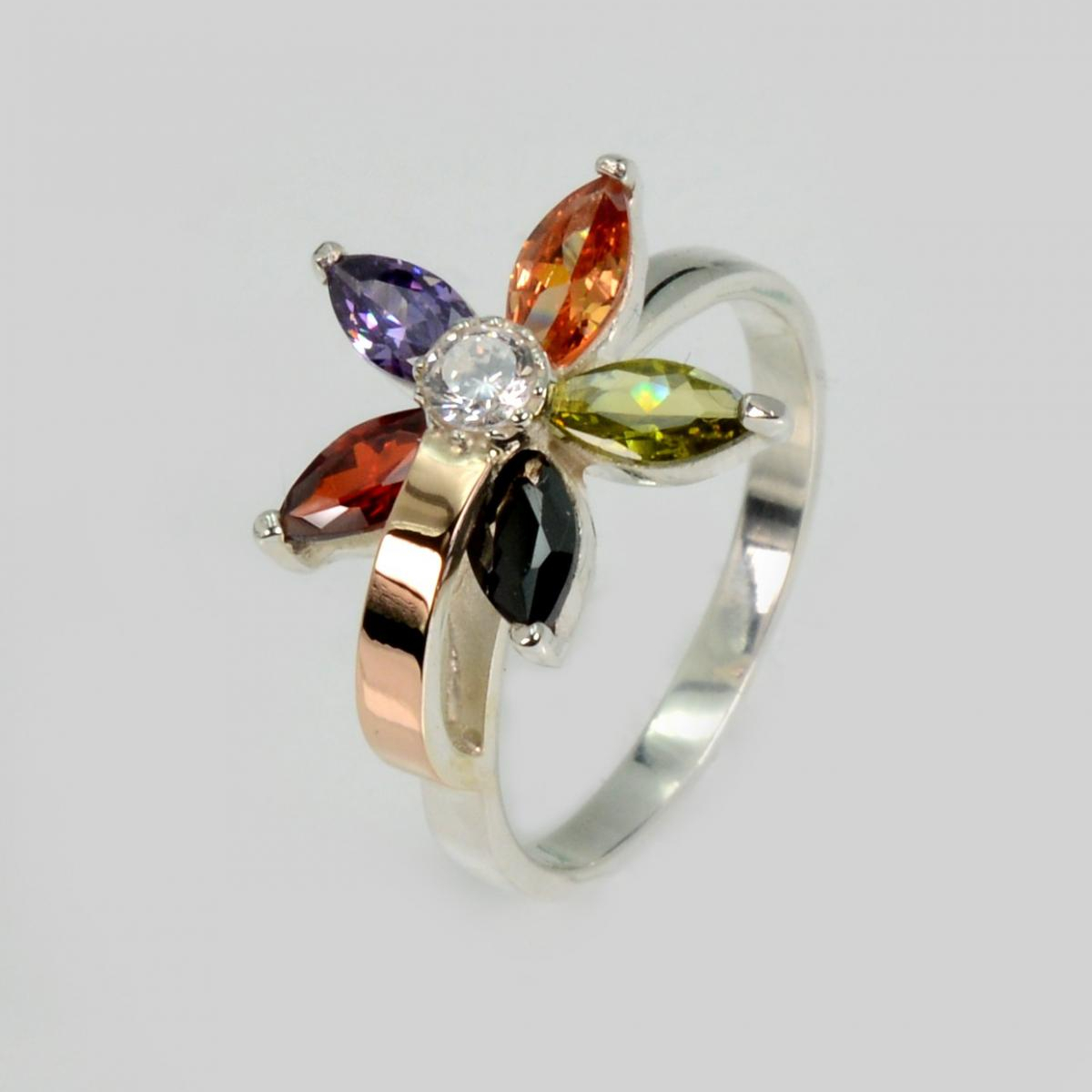 Срібна каблучка з золотими вставками