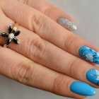 Срібна каблучка з золотими вставками