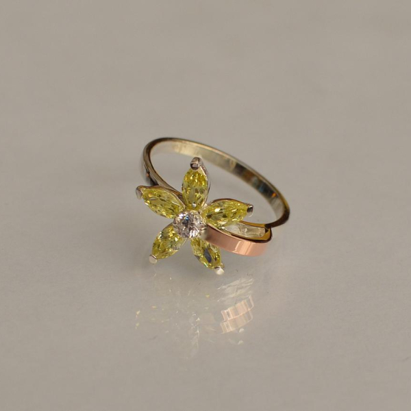 Срібна каблучка з золотими вставками