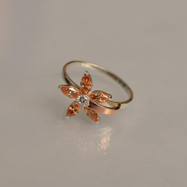 Срібна каблучка з золотими вставками