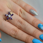 Срібна каблучка з золотими вставками