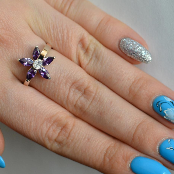 Срібна каблучка з золотими вставками