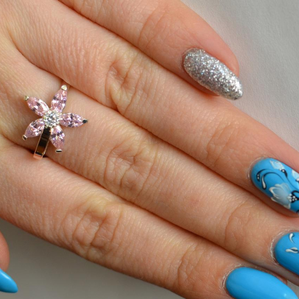 Срібна каблучка з золотими вставками