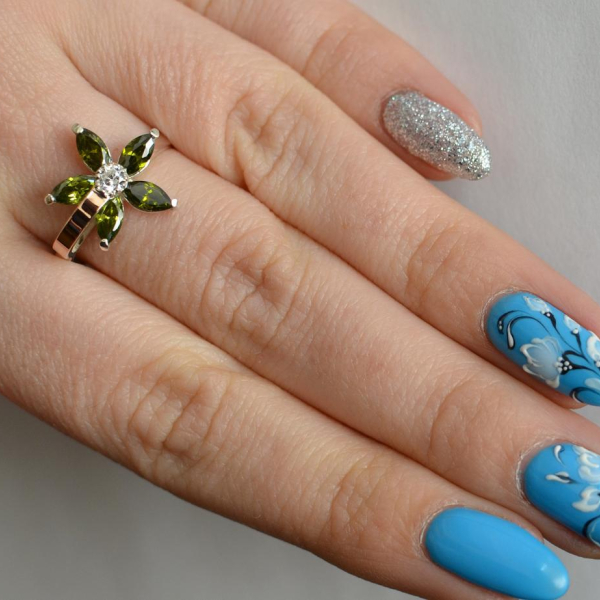 Срібна каблучка з золотими вставками