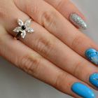 Срібна каблучка з золотими вставками