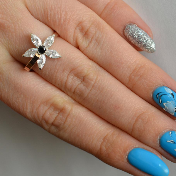 Срібна каблучка з золотими вставками