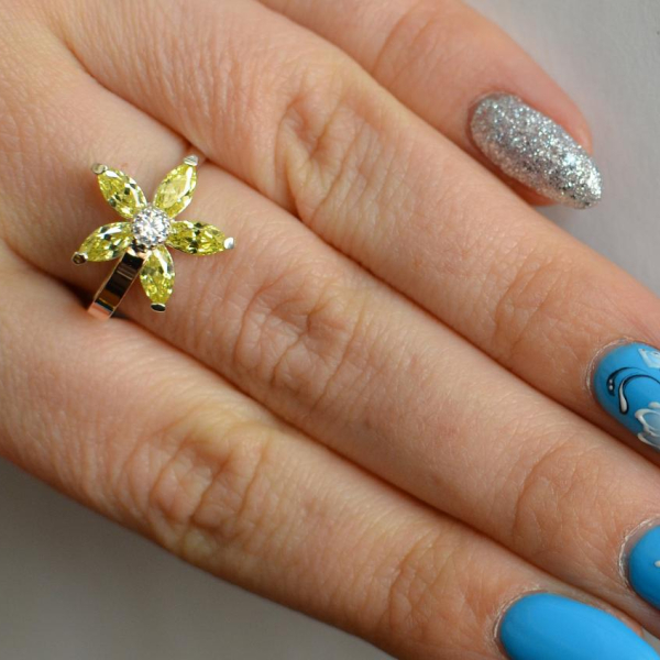 Срібна каблучка з золотими вставками