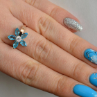 Срібна каблучка з золотими вставками