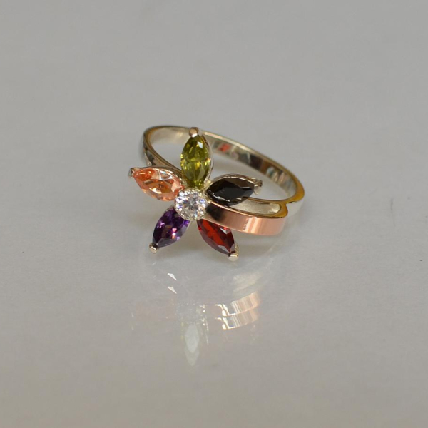 Срібна каблучка з золотими вставками