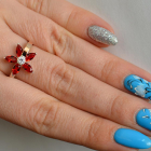 Срібна каблучка з золотими вставками