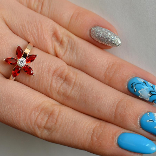 Срібна каблучка з золотими вставками