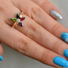 Срібна каблучка з золотими вставками