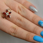 Срібна каблучка з золотими вставками