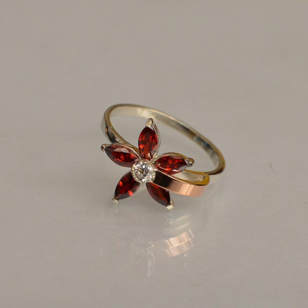 Срібна каблучка з золотими вставками