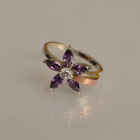 Срібна каблучка з золотими вставками