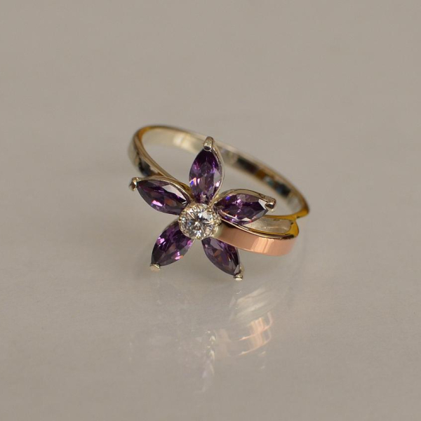 Срібна каблучка з золотими вставками