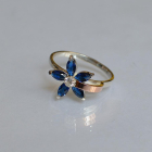 Срібна каблучка з золотими вставками