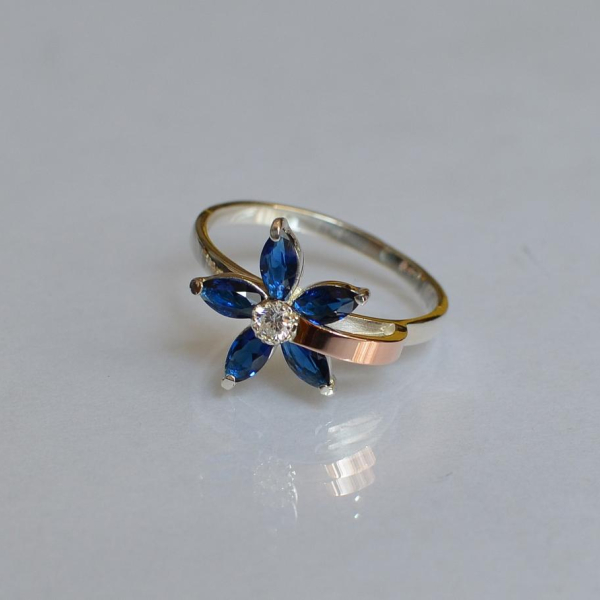 Срібна каблучка з золотими вставками