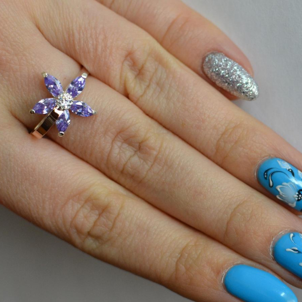 Срібна каблучка з золотими вставками