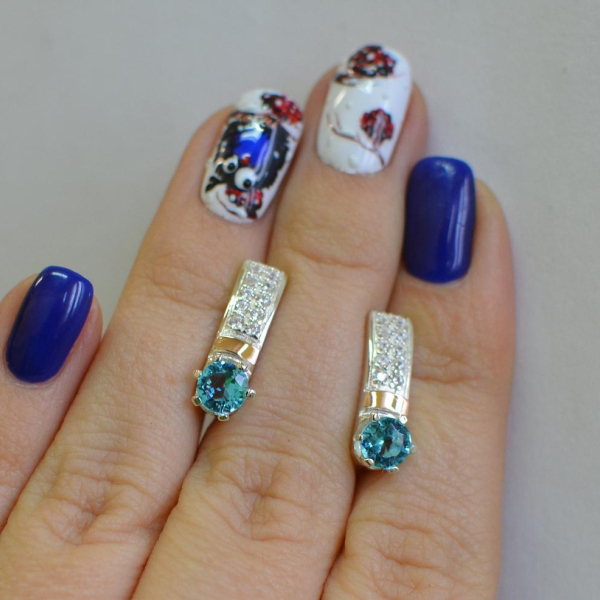 Срібні сережки  зі вставками з золота