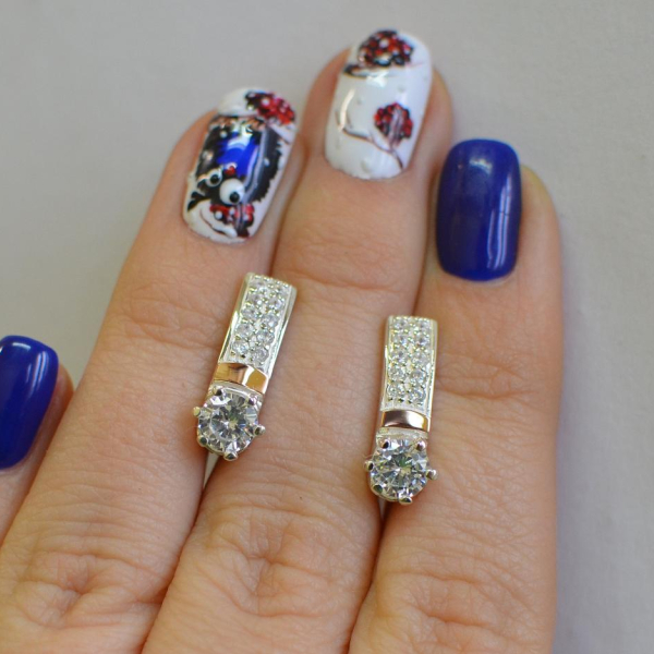 Срібні сережки  зі вставками з золота