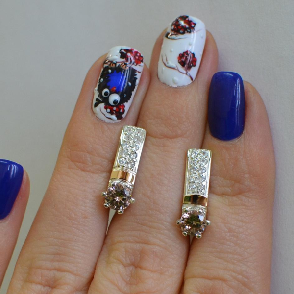 Срібні сережки  зі вставками з золота