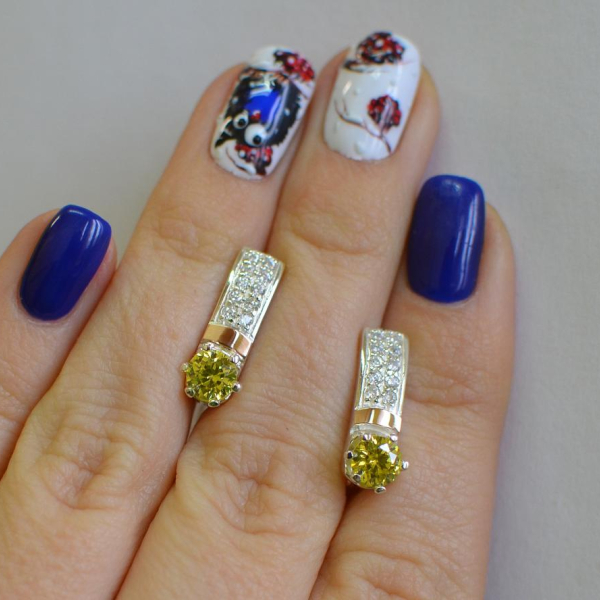 Срібні сережки  зі вставками з золота