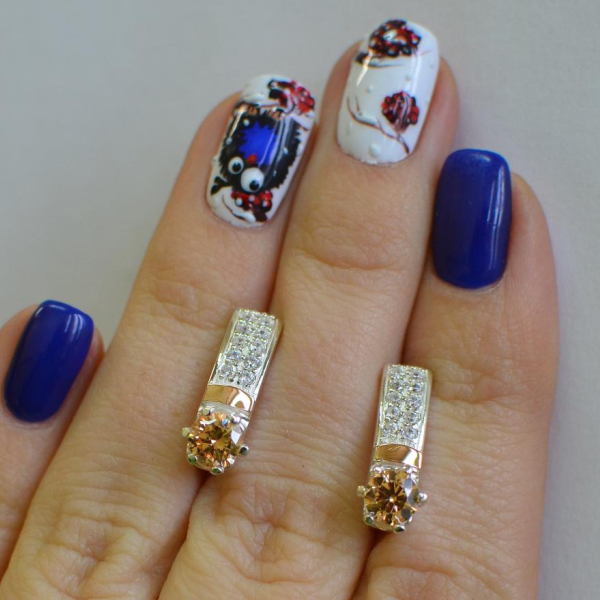 Срібні сережки  зі вставками з золота