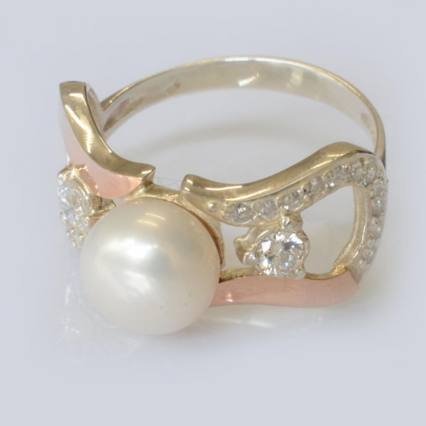 Срібна каблучка з золотими вставками