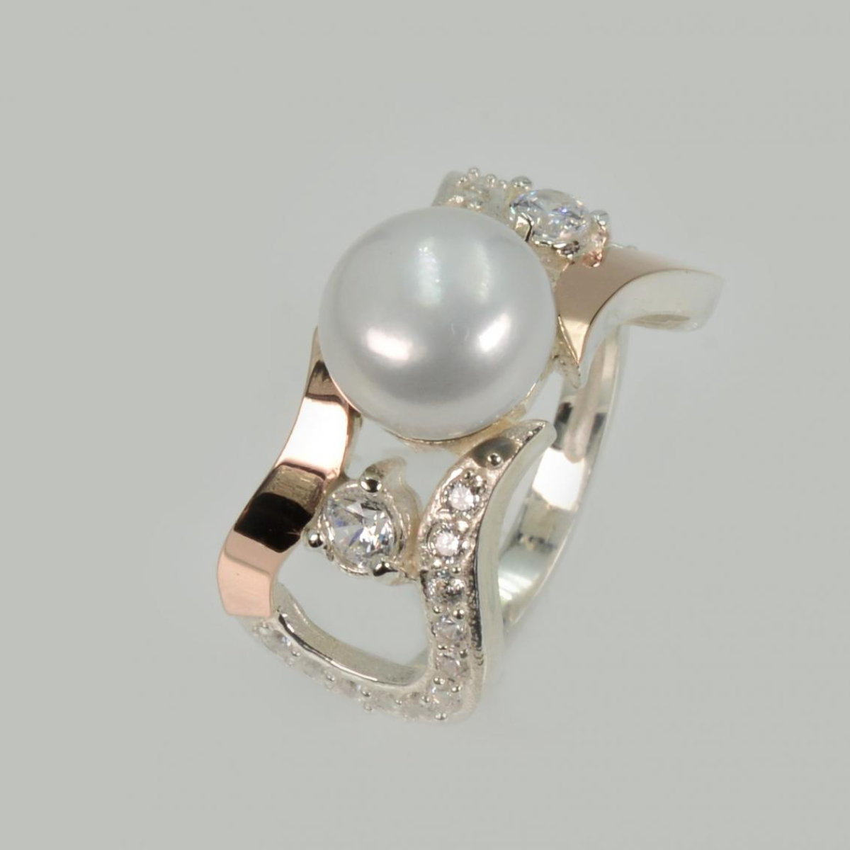 Срібна каблучка з золотими вставками