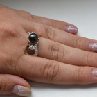 Срібна каблучка з золотими вставками