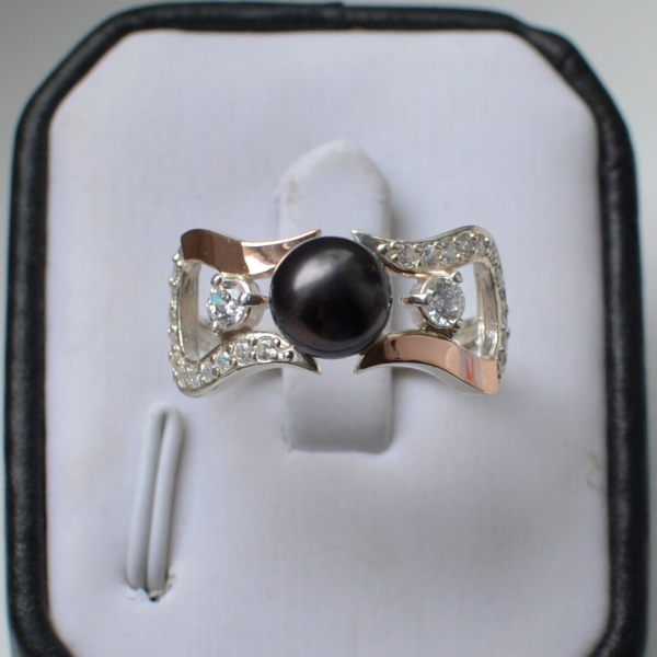 Срібна каблучка з золотими вставками