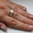 Срібна каблучка з золотими вставками