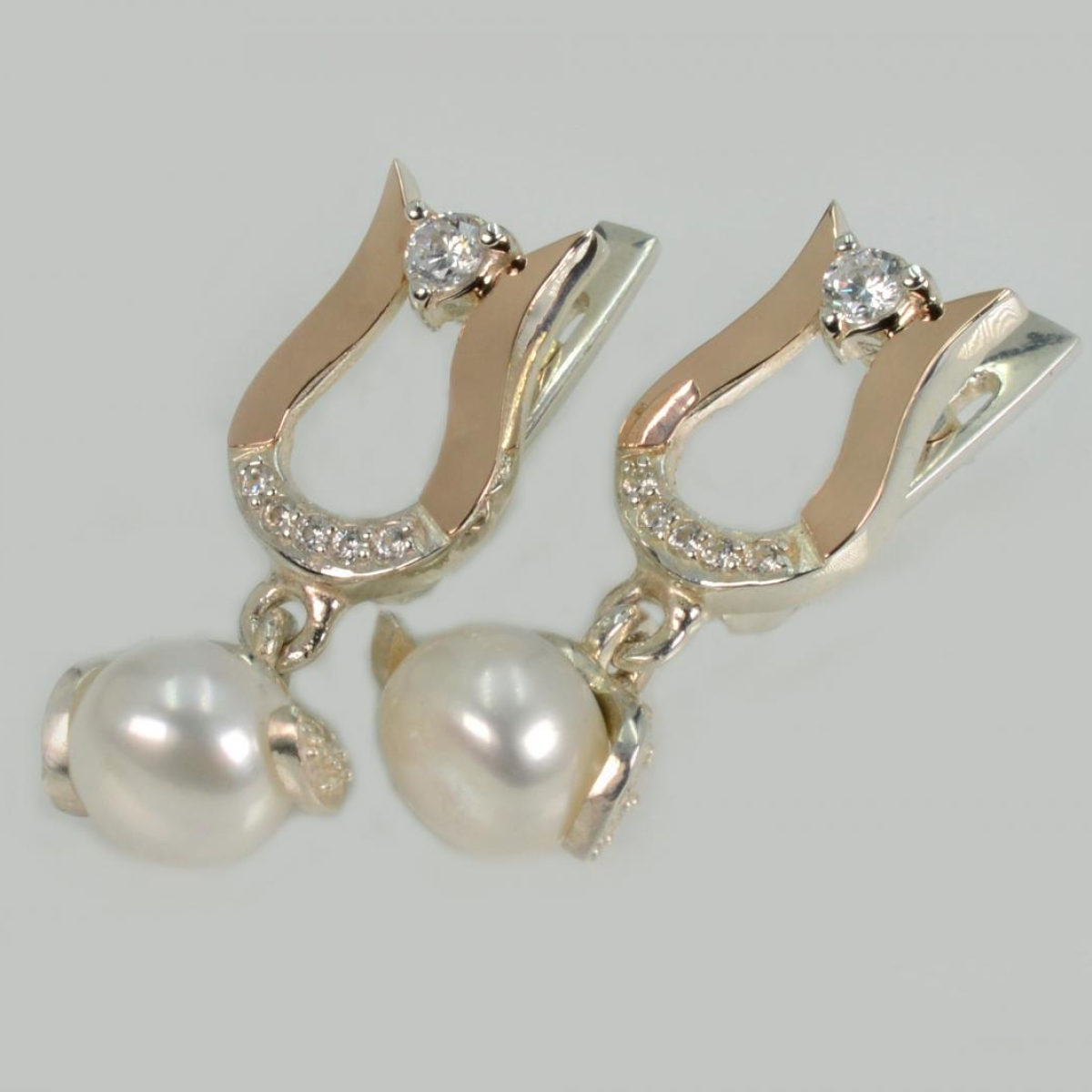 Срібні сережки з накладками з золота