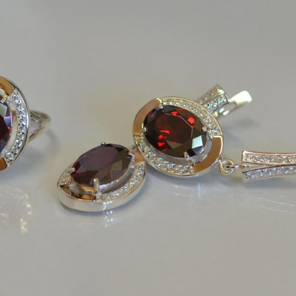 Срібний комплект з золотими пластинами