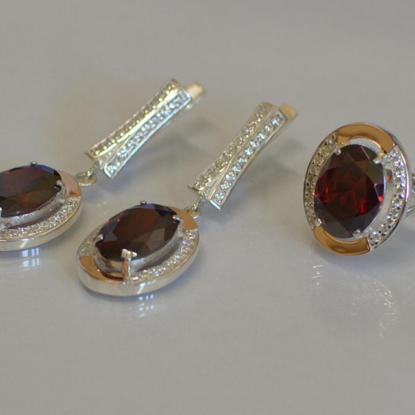 Срібний комплект з золотими пластинами