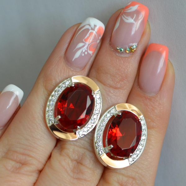 Срібні сережки з золотими вставками