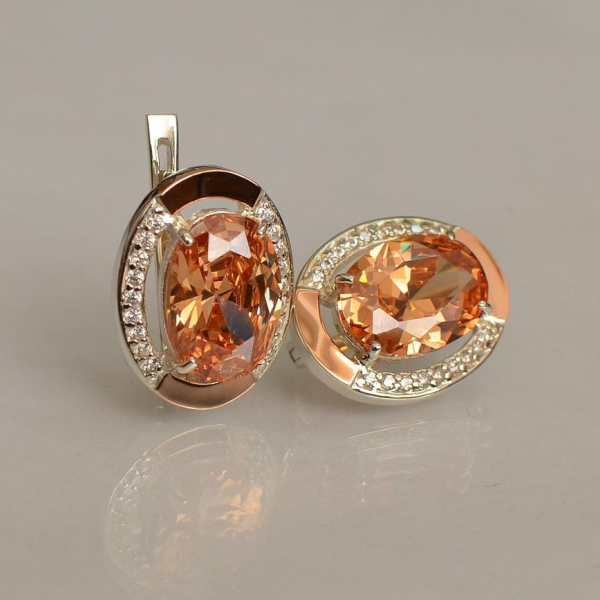 Срібні сережки з золотими вставками