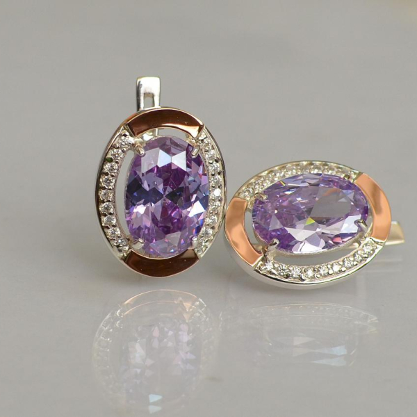 Срібні сережки з золотими вставками