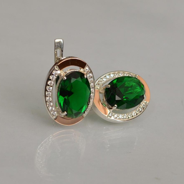 Срібні сережки з золотими вставками