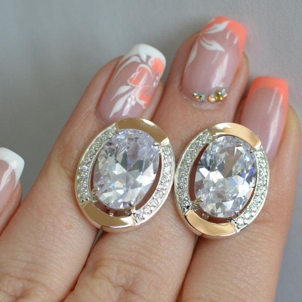 Срібні сережки з золотими вставками