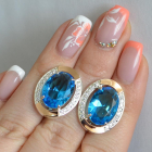 Срібні сережки з золотими вставками