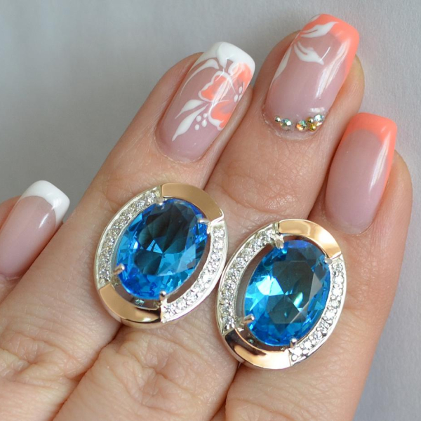 Срібні сережки з золотими вставками