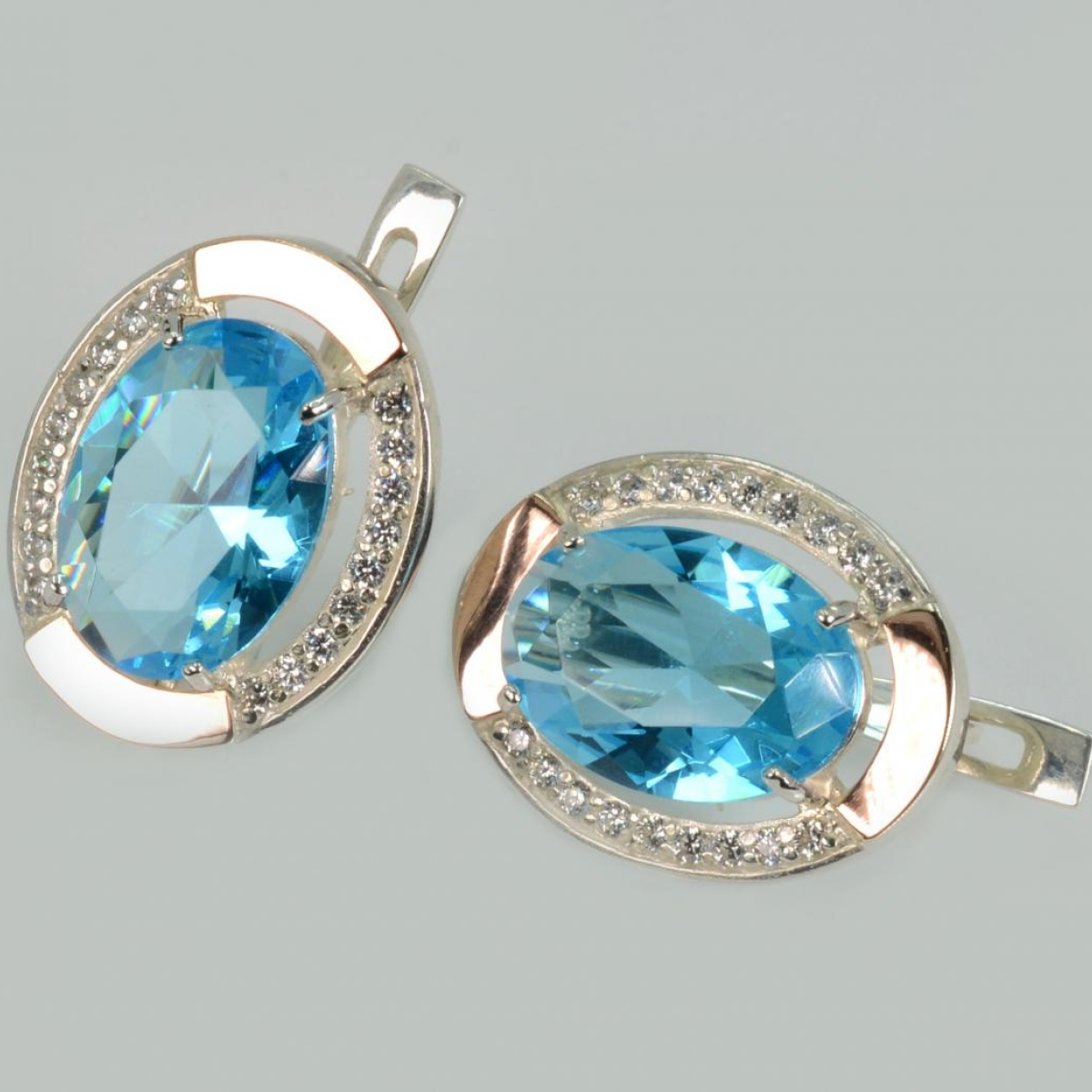 Срібні сережки з золотими вставками