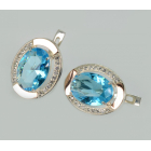 Срібні сережки з золотими вставками