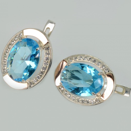 Срібні сережки з золотими вставками