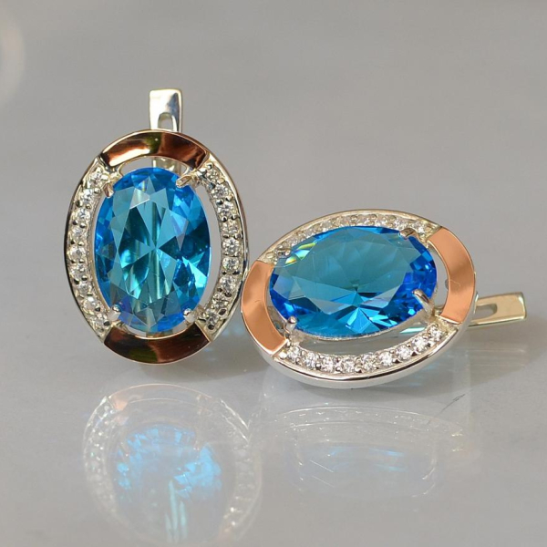 Срібні сережки з золотими вставками