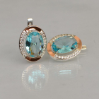 Срібні сережки з золотими вставками