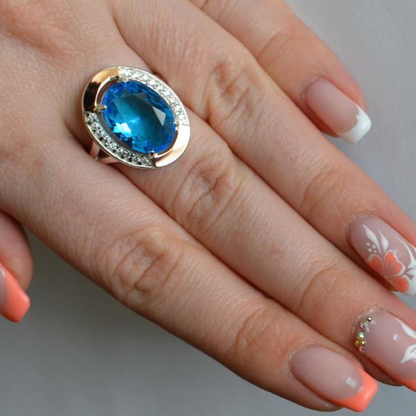 Срібна каблучка  зі вставками з золота