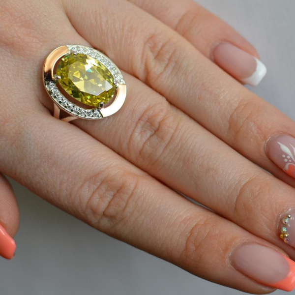 Срібна каблучка  зі вставками з золота